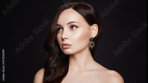 Beautiful young brunette woman. sexy model girl with jewelry