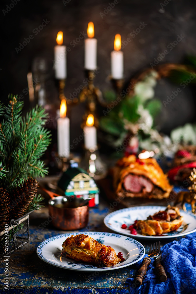 Naklejka premium Beef Wellingon on a festive, New Year's table