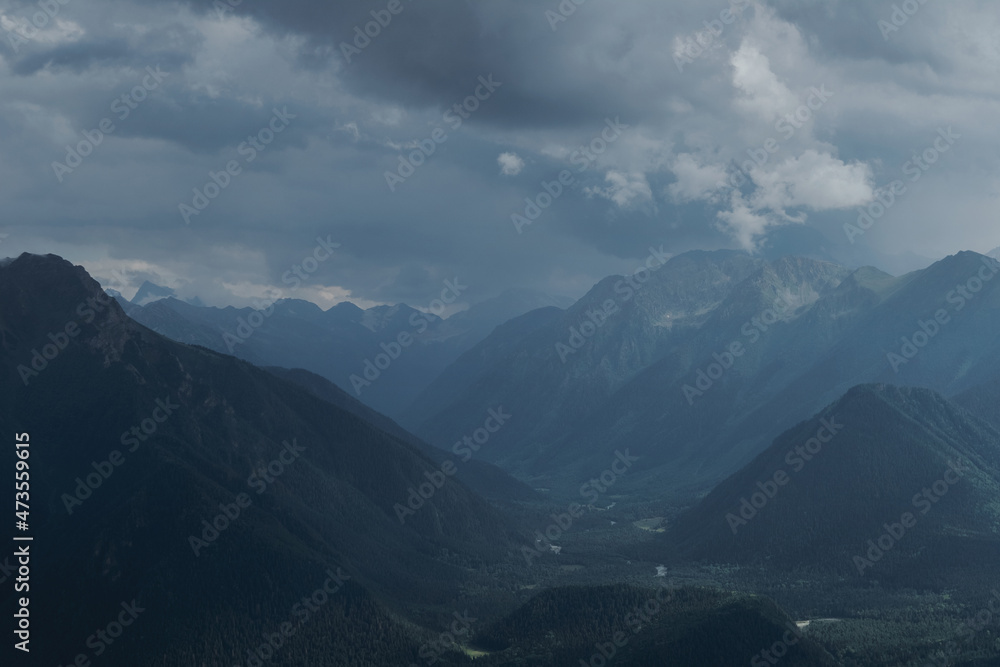 Fototapeta premium Storm in the valley of the Bolshoy Zelenchuk river, tourist resort of Arkhyz.
