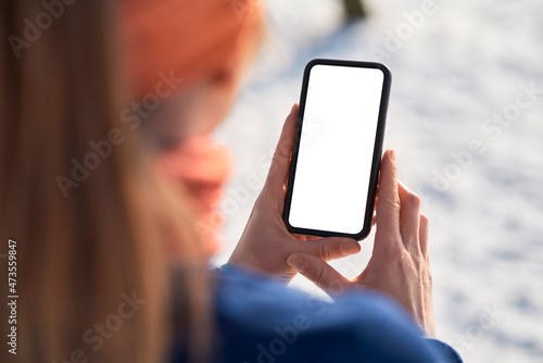 Woman holding smart phone