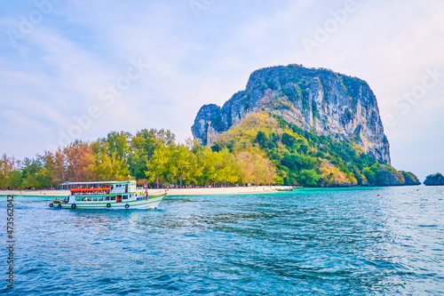 Sailing along Koh Poda island in Andaman Sea, Thailand photo