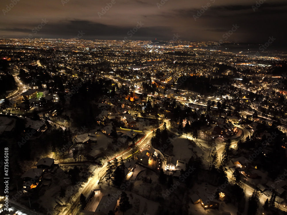 Fototapeta premium night city photo of oslo, norway a winter night. shot with a drone high up in the sky