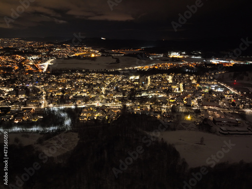 night city photo of oslo, norway a winter night. shot with a drone high up in the sky © SteinOve