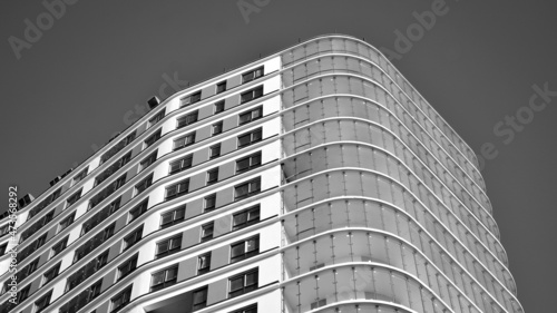 Abstract fragment of contemporary architecture. Residential area in the city, modern apartment buildings. Black and white. 