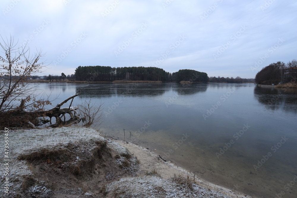 Big lake in the forest in winter Big lake in the forest in winter