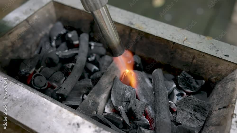 4k, Charcoal stove with black charcoal inside all the power points to be set on fire to prepare for grilling food. 4k, Charcoal stove with black charcoal inside all the power points to be set on fire to prepare for grilling food.