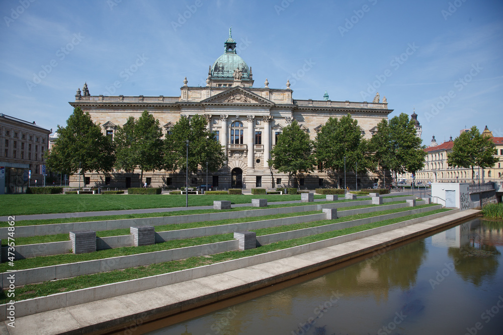 Leipzig, Saxony, Germany - 08.31.2015:  a city park by Federal Administrative Court  (Bundesverwaltungsgericht) in Leipzig. It is one of five supreme courts in Germany.