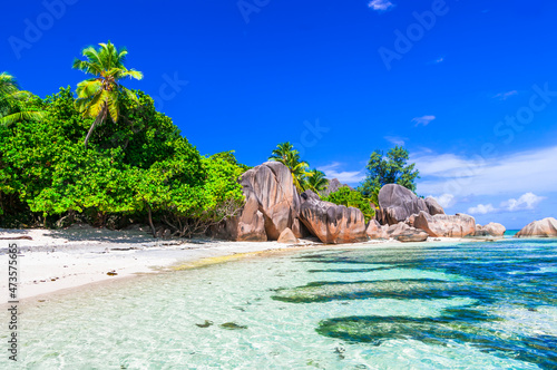 One of the most scenic and beautiful tropical beach in the world - Anse source d'argent in La figue island, Seychelles