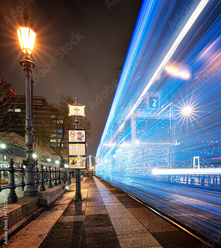Illuminated Yellow Tram in ...