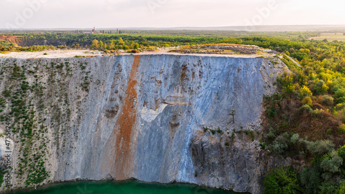 Radon quarry in Ukraine in the rays of the sun. Mining industry. Alexandrovka, Ukraine photo