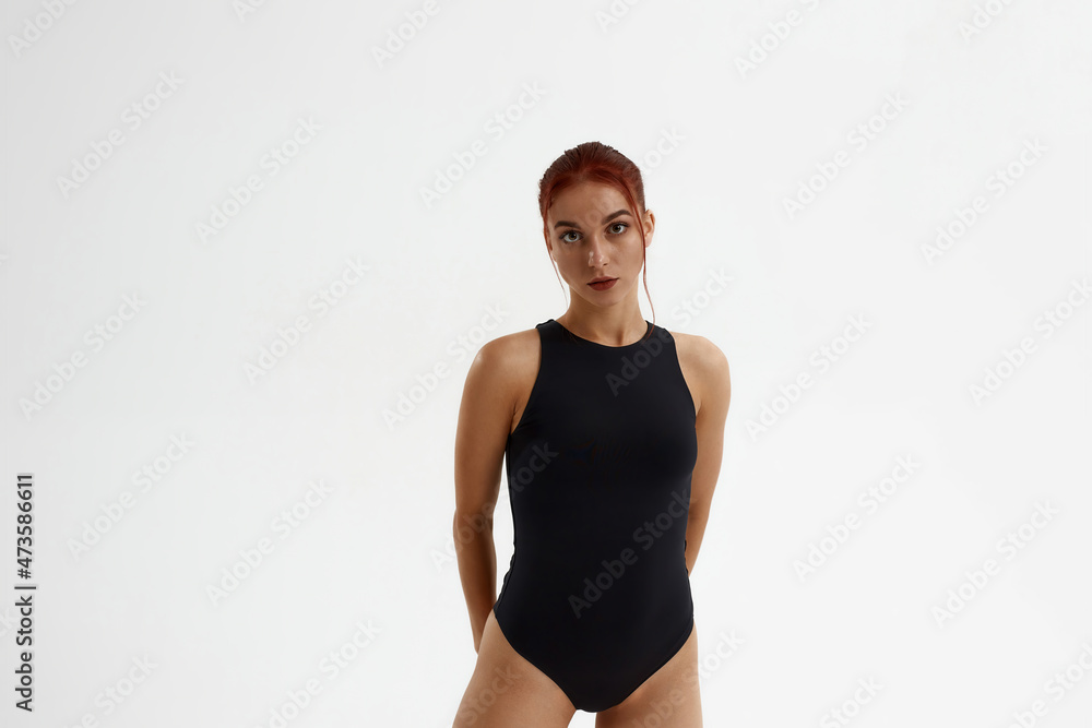 Caucasian female ballet dancer looking at camera Caucasian female ballet dancer looking at camera