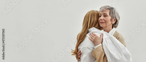 Loving old mother hug support grownup daughter
