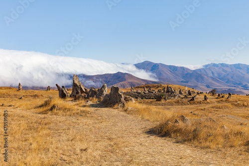 Standing stones in Zorats-Karer or Karahunj. Ancient megalithic complex  Syunik region of Armenia.