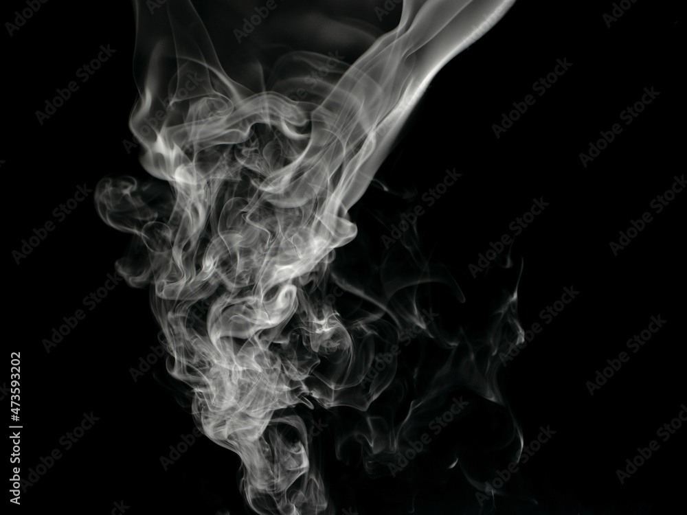 Chaotic mixing smoke creates abstract patterns on a black background Chaotic mixing smoke creates abstract patterns on a black background