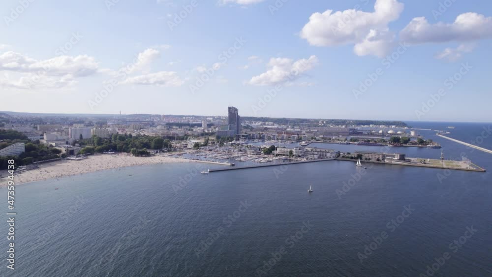 Gdynia city by the sea on a sunny day from a drone. Summer colors and sun rays in Gdynia. Gdynia city by the sea on a sunny day from a drone. Summer colors and sun rays in Gdynia.