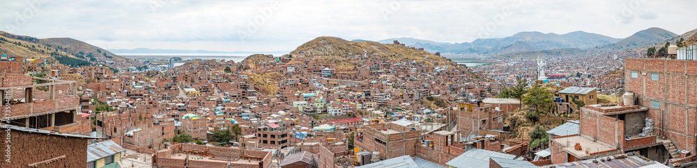 Puno is a city on the shores of Lake Titicaca in Peru