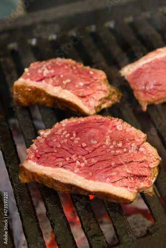 Barbecue sliced steak roasting on the coals. This form of barbecue is widely consumed throughout Brazil.