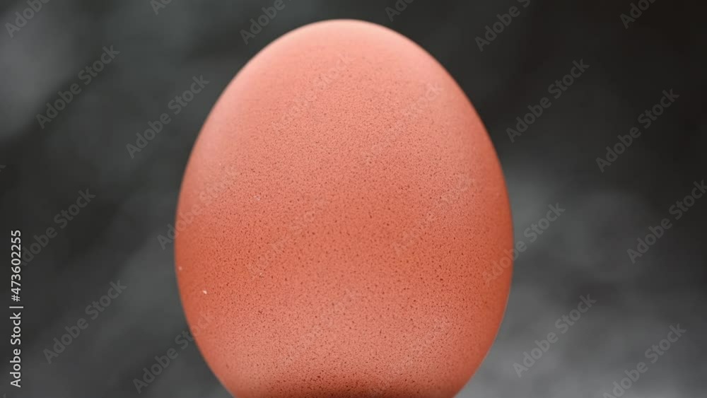 Slide shot of video 4k and full HD of quality healthy organic egg with eggshell isolated on clean background.
Slide shot of video 4k and full HD of quality healthy organic egg with eggshell isolated on clean background.