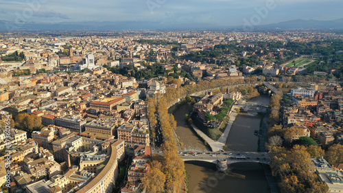 Aerial drone photo of Tiber island or Isola Tiberina, a small island in a bend of the River Tiber with a number of historical buildings and monuments, Rome historic centre, Italy photo
