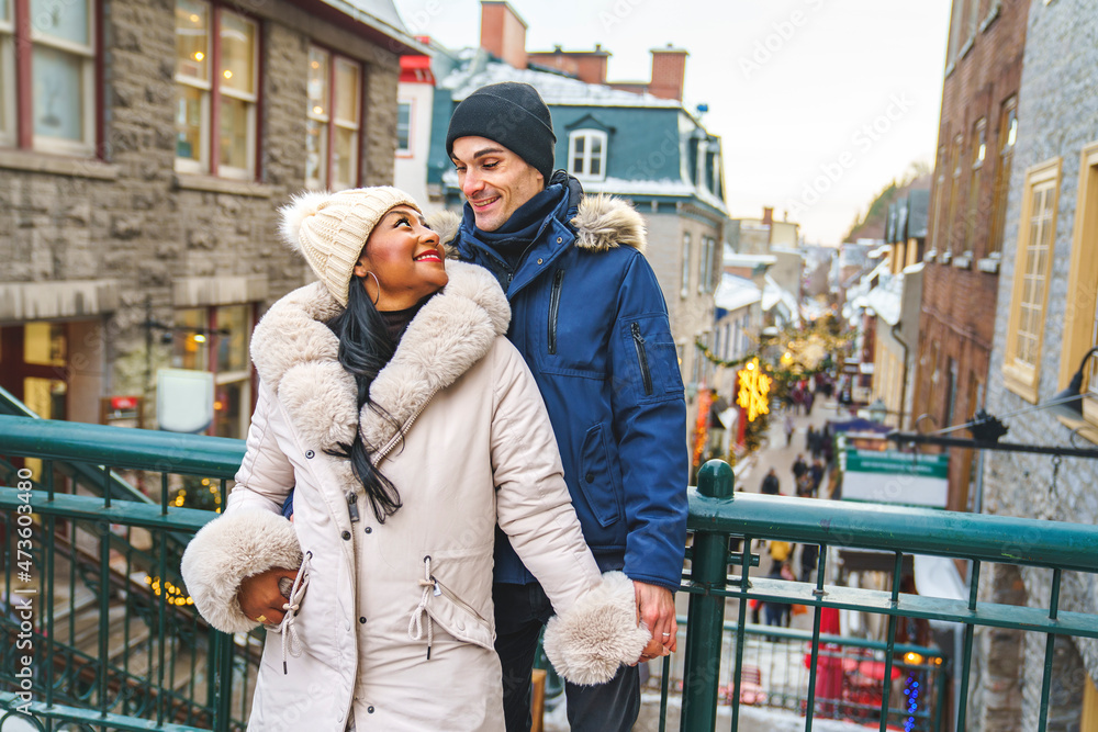 Portrait of a beautiful young couple on a winter season with coat Portrait of a beautiful young couple on a winter season with coat