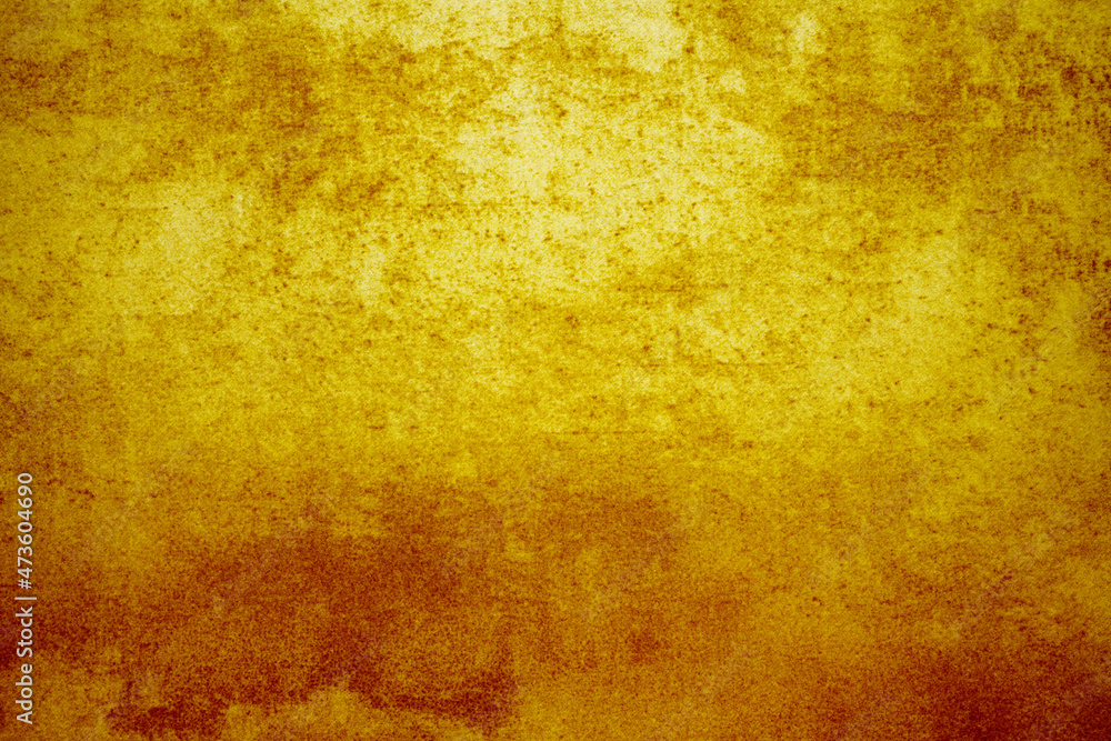 abstract background texture of aged, bright, grunge wall with structure in golden, orange or autumn color feel.