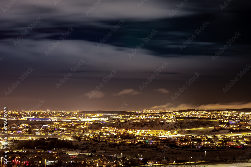 Winter night panorama of Hafnarfjordur city, Iceland. 