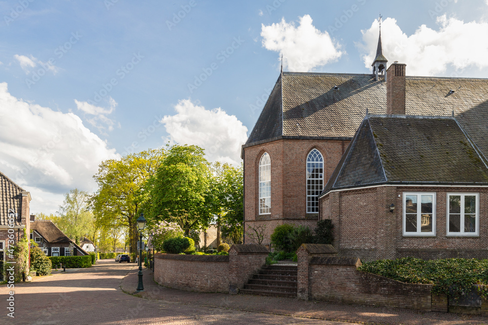 View of the old church and houses in the center of the Dutch village Soest. View of the old church and houses in the center of the Dutch village Soest.