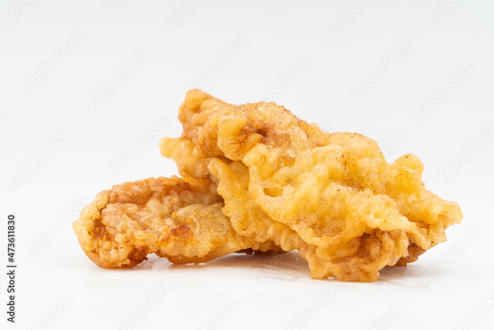 Fresh fried pork tenderloin on pure white background Fresh fried pork tenderloin on pure white background