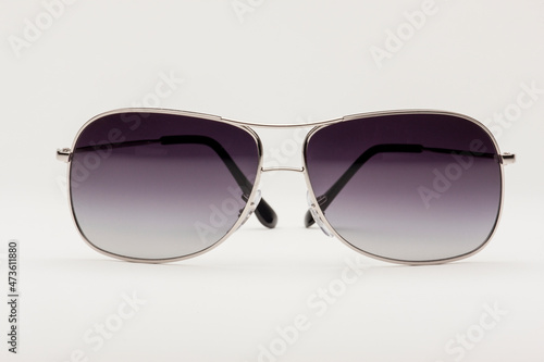 Straight on shot of a pair of modern Aviator sunglasses.