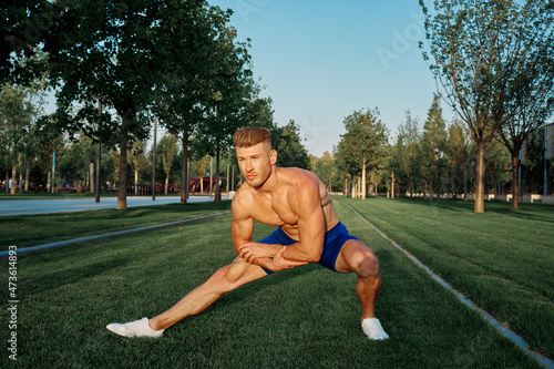 athletic man workout in the park fitness cardio