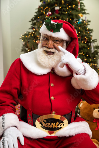 Modern representation of Santa Claus as a Black man. photo