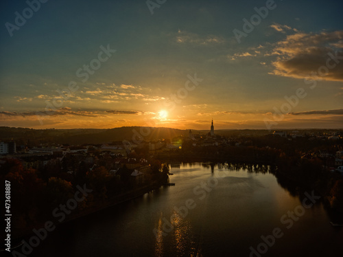 Fotografija aerial view of Tabor czech republic, lake and church tower winter morning sunlig