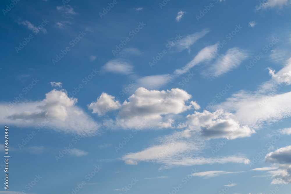 White clouds on blue sky. Nature background. Freedom concept