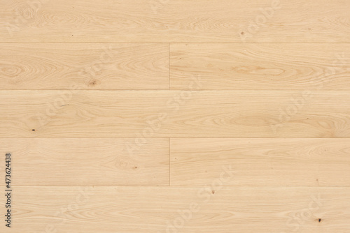Modern stilish wooden parquet texture, wooden floor background. Top view