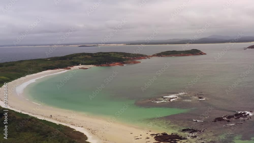Coast of Broughton island off Pacific shores of Australia – bay, beach in 4k.
Coast of Broughton island off Pacific shores of Australia – bay, beach in 4k.