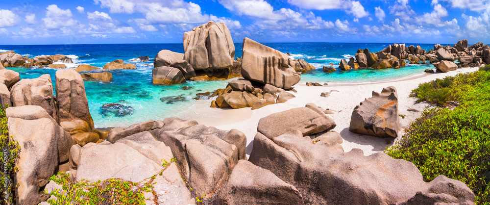 Beauty in nature. Seychelles islands. Unique tropical beach with granite rocks - Anse Cocos in La Digue island