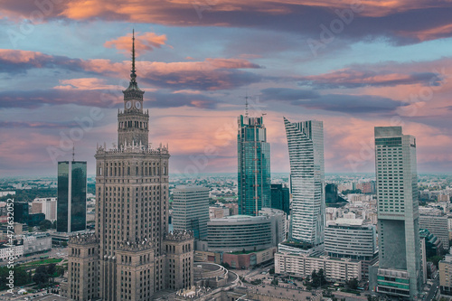 Aerial view of palace of art and culture in Warsaw, Poland on a cloudy and rainy afternoon. wide panorama of beautiful portrait of polish historical sight