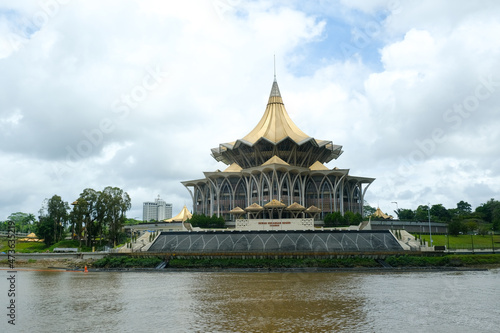 "Kuching, Malaysia-Circa December, 2021: A picture of Dewan Undangan Negeri or Sarawak State Assembly Complex with river and cloud insight. Sarawak is preparing for state election."