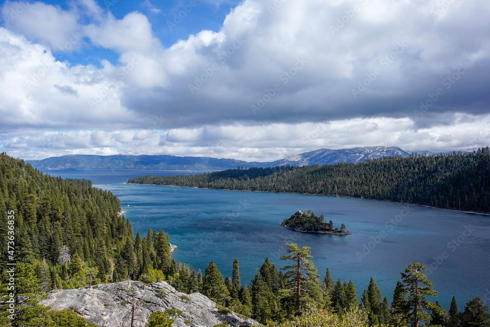 Lake Tahoe at the end of summer with snow on the distant mountains in California, from Inspiration Point