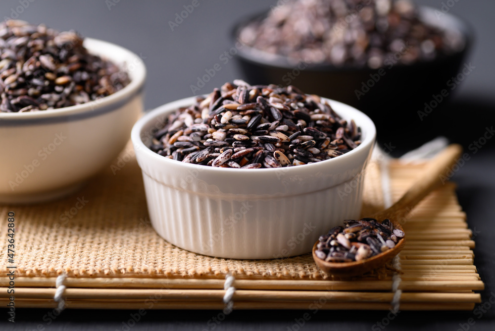 Thai purple glutinous rice grain in bowl, Organic and healthy food Thai purple glutinous rice grain in bowl, Organic and healthy food