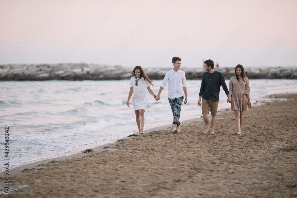 Happy Friends Walking On Te Shoreline Happy Friends Walking On Te Shoreline