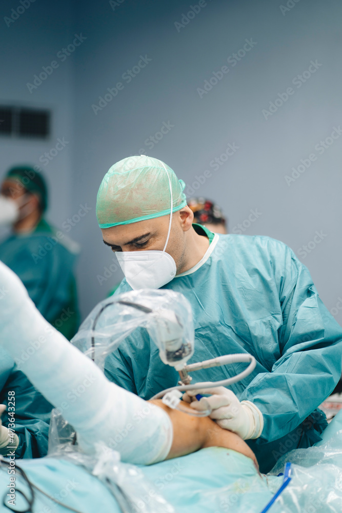 Professional surgeon with equipment at work Professional surgeon with equipment at work