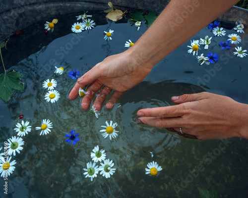 Hands in water photo