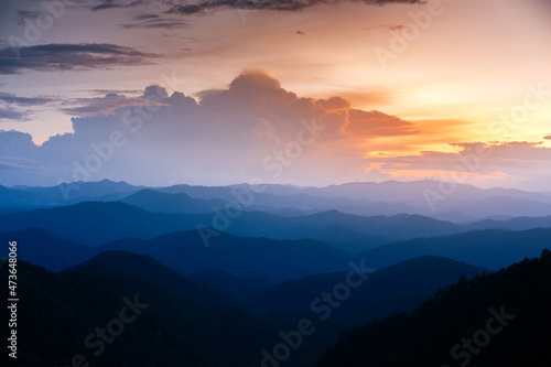 Majestic sunset sky over blue mountains landscape © nutt