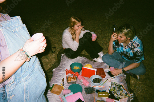 Teenagers Having Night Out in Park  photo