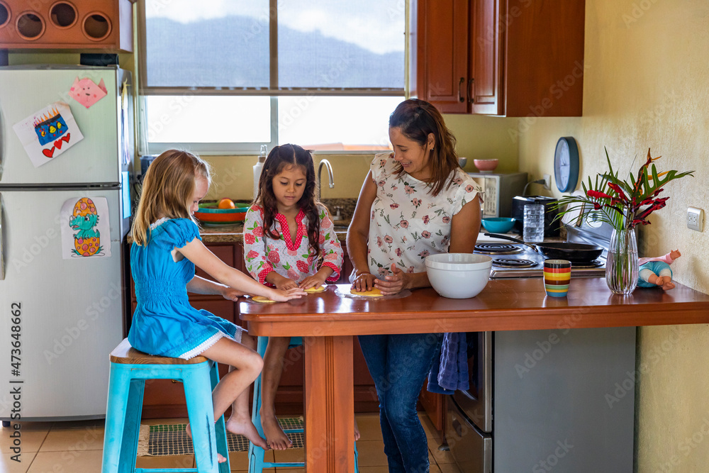 Family Tortilla Making in kitchen Family Tortilla Making in kitchen