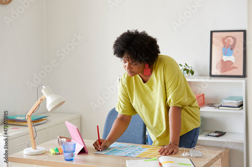 Woman working on design project photo