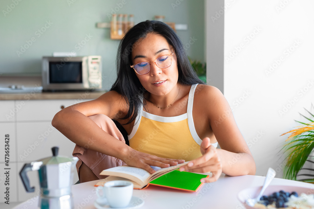 Asian Woman Reading at Home Asian Woman Reading at Home
