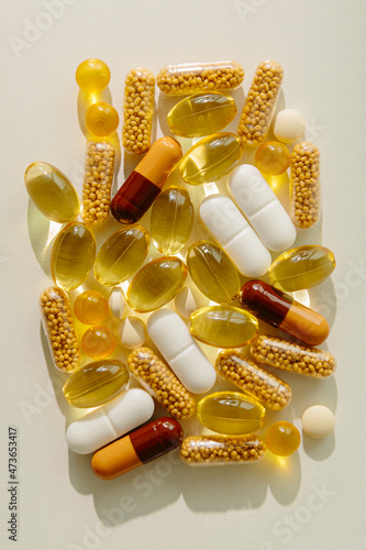 Yellow supplement pills photo