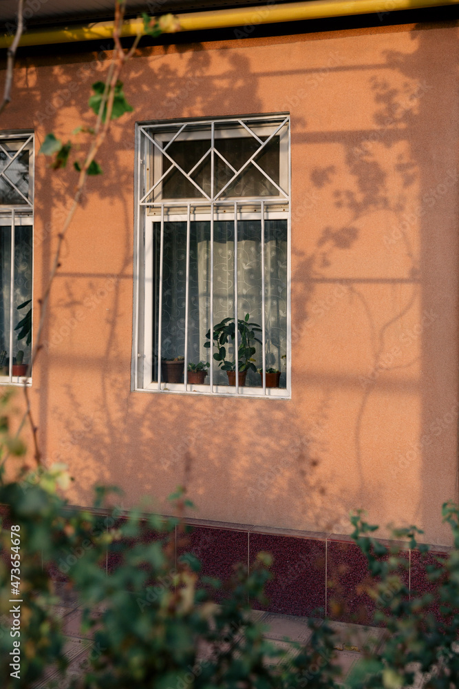 Evening Sunlight and Shadows on Building Facade